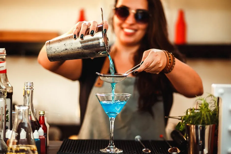 A bartender shaking a cocktail shaker, stirring a mixing glass, muddling ingredients, and layering ingredients in a glass.